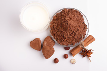 Chocolate heart-shaped candy on a white background, chocolate composition