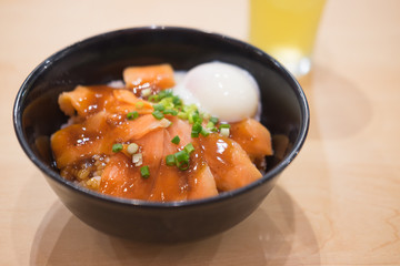 Slice of salmon with japanese rice and onsen egg