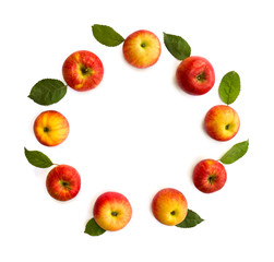 Ripe yellow-red juicy apples and leaves apple tree on white background with space for text. Top view, flat lay