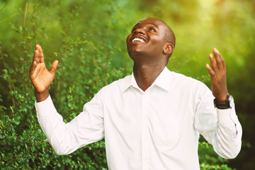 Smile african man praying for thank god.