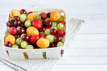 Mixed Fresh fruits wood Background. Selective focus and copy space.