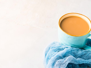 Mug of coffee with milk. Pastel colors. Minimal hot drink background