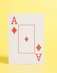 Ace of hearts on yellow background