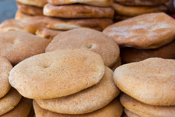 Fototapeta na wymiar loafs of traditionsl khobz bread in bakery in morocco