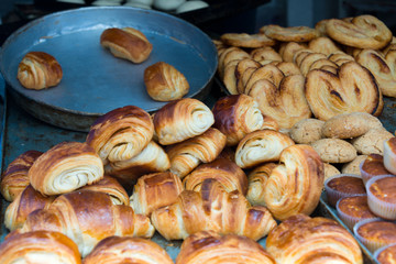 pastries on display in market bakery in morocco