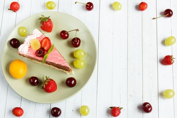 Naklejka na ściany i meble Cake with fresh fruits, copy space and selective focus