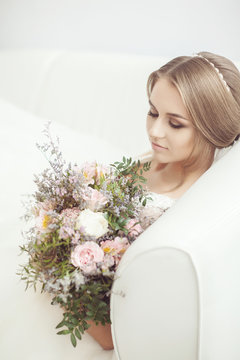 Portrait of a bride with a bouquet