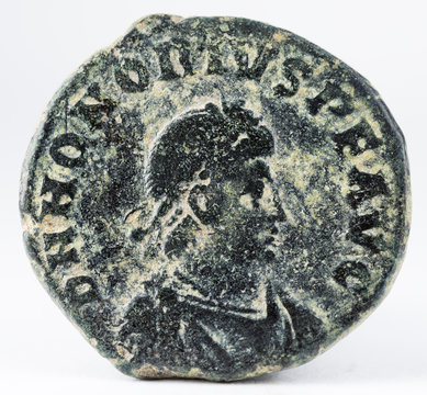 Ancient Roman copper coin of Emperor Honorius. Obverse.