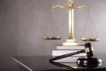 Law symbols, gavel, scale, books. Law concept background. Place for text.