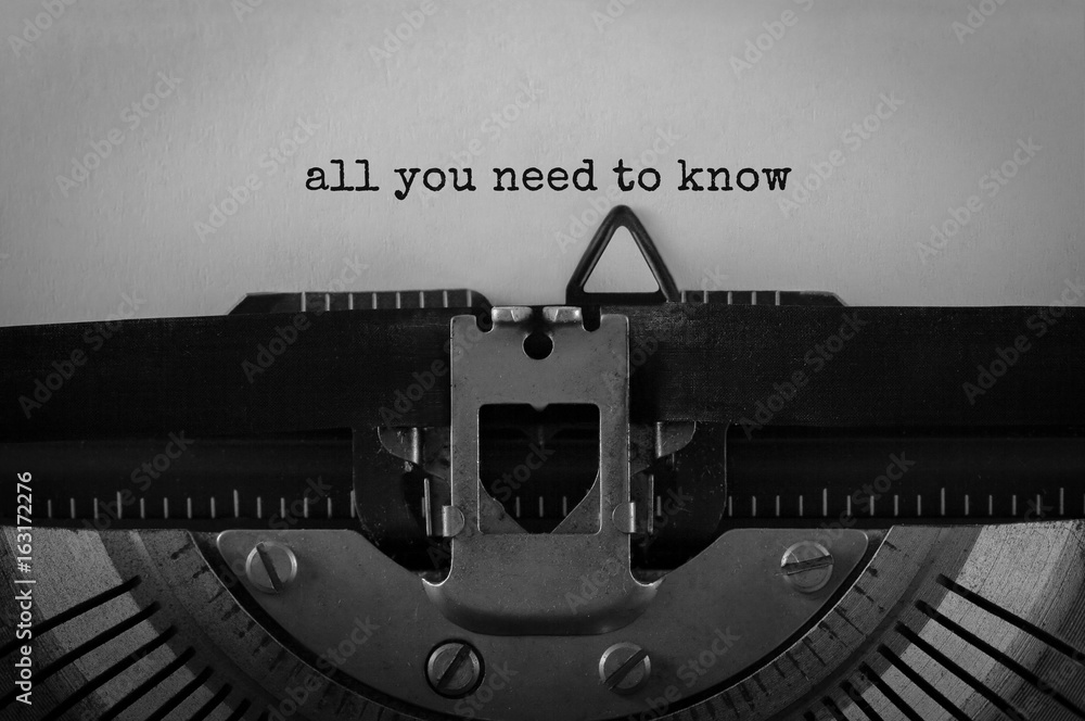 Aufkleber Text All you need to know typed on retro typewriter