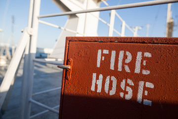 Fire hose on a ship © bizoo_n