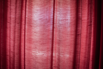 Red crumpled curtain