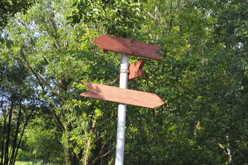 Wooden pointer in the park