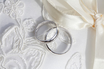 Wedding rings on beautiful background