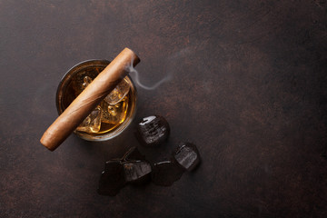 Whiskey with ice and cigar © Evgeny Karandaev