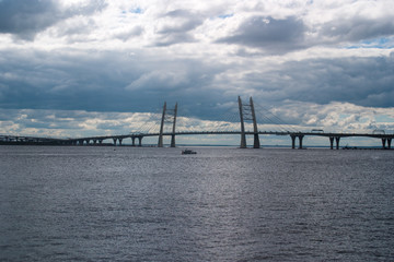 Fototapeta na wymiar Cable-stayed bridge over Korabelny fairway - part of the Western high-speed diameter in Saint-Petersburg.