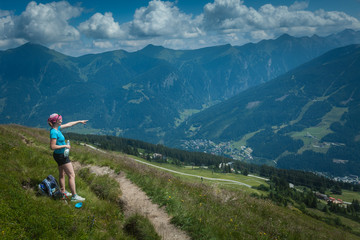 Fototapeta na wymiar Young woman on a mountain hike, Austrian Alps