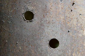 Iron sheet with two holes. Background