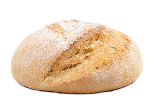 Wheat loaf of bread on white background.