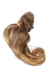 Naklejka premium Curl of blond hair on a white background.