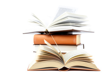 Books in a stack on white background.