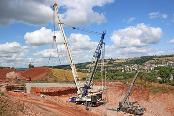 Crane laying a new bridge