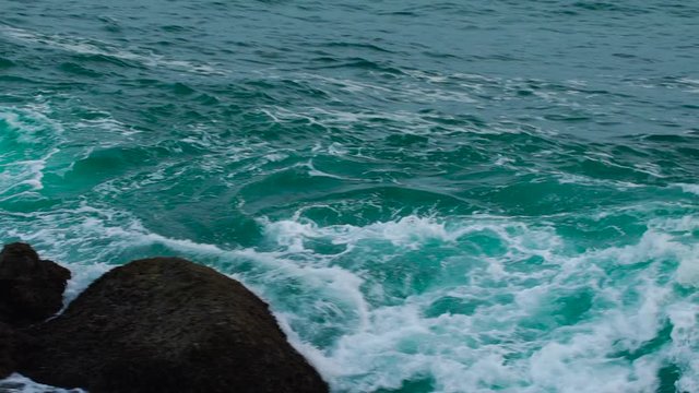 Amazing pano of slow motion rise of sea wave from beginning to end