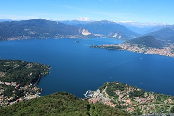 Fototapeta na wymiar Panoramic view from Mount Sasso del Ferro in Laveno to the landscape of Lake Maggiore, Italy