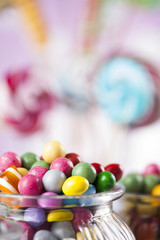 Fototapeta na wymiar Colorful lollipops and candy, gumballs