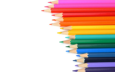 school and office supplies. school background. colored pencils isolated on white background