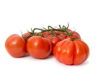 fresh red tomatoes isolated on white