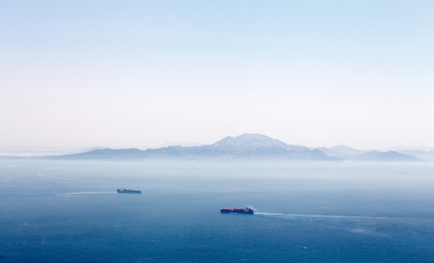 Gibraltar strait with passing tankers - 163183254