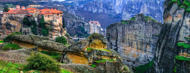 Fototapeta premium Landmarks of Greece - unique Meteora with hanging monasteries over rocks