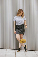 beautiful female model with casual clothes on the street