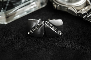 Silver cufflinks, black and white photo