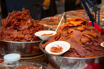 Thai seafood. Dried fish snacks on the market counter