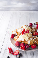 Croissants, corn flakes and berries