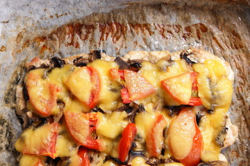 Meat dish with cheese and vegetables from the oven