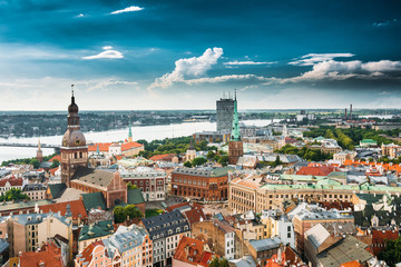 Fototapeta na wymiar Riga, Latvia. Cityscape In Sunny Summer Day. Famous Landmarks - Riga Dome