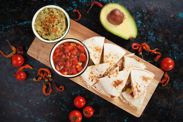 Mexican quesadillas with salsa and guacamole