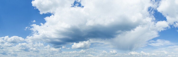 Naklejka na ściany i meble Sunny blue sky background with clouds Panorama Photo