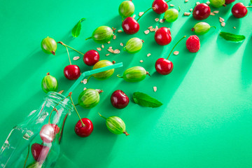 Juice ingredients on green background