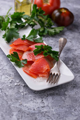 Smoked salmon fillet with parsley
