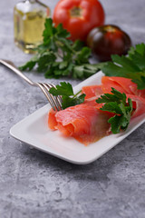 Smoked salmon fillet with parsley
