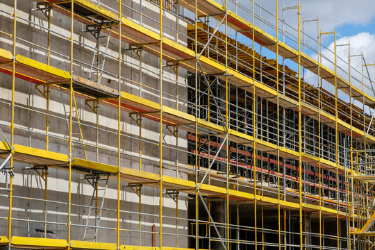scaffolding on building facade , construction site  