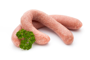 Raw sausages with herbs and spices.