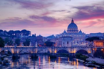 Fototapeta na wymiar View to bridge and Vatican City at sunset. Rome, Italy