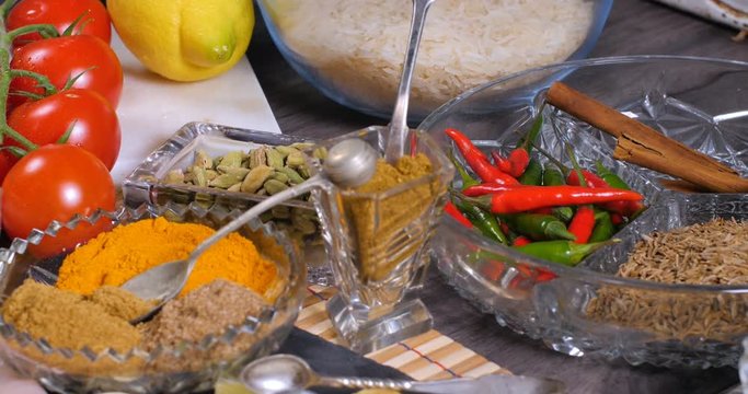 Dolly push out view of ingredients and indian spices for chicken tikka masala
