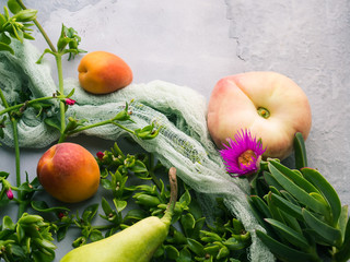 Fresh summer fruit concept still life - peaches, apricots and pears