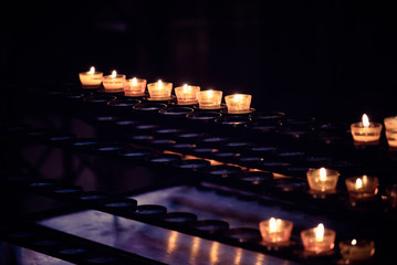 Row of candles in a church